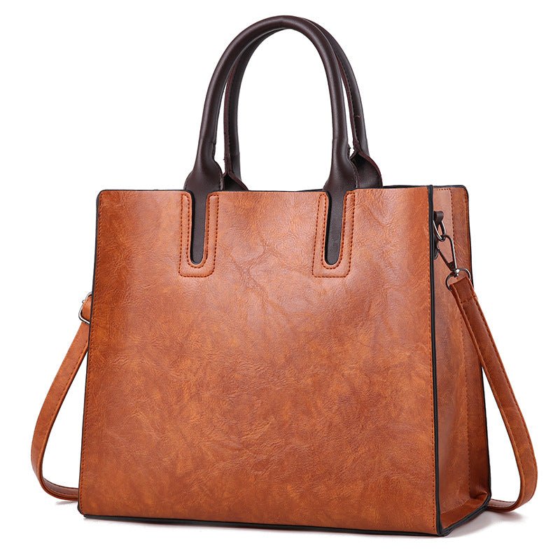 Women’s handbag by Plush Fashion Hub featuring a sleek design, top handles, and stylish details for everyday use.