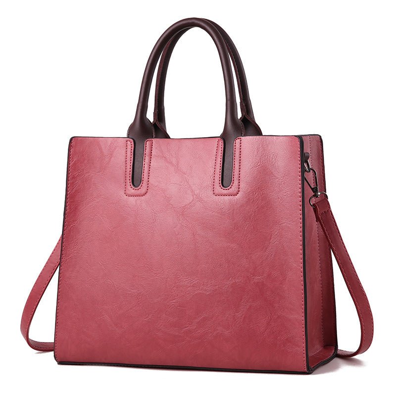 Women’s handbag by Plush Fashion Hub featuring a stylish design, leather texture, and elegant handles.