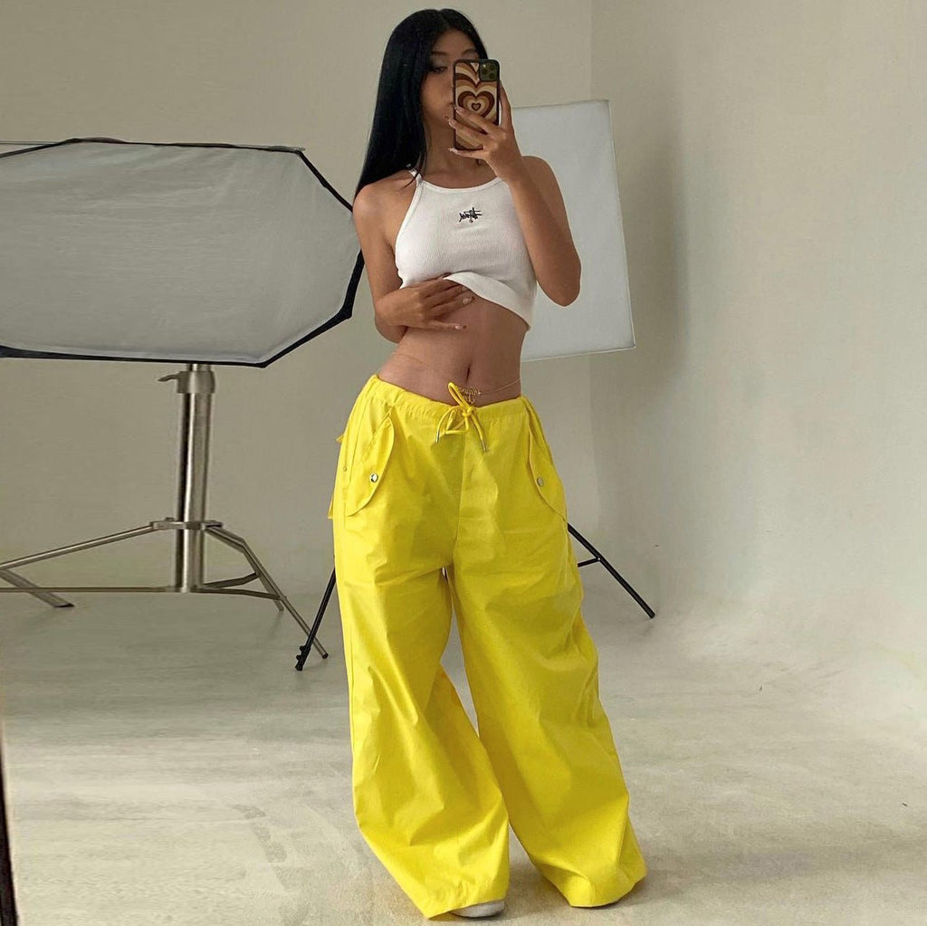 Women's high-waist lace-up straight-leg cargo pants in loose fit, casualwear by Plush Fashion Hub, displayed flat.