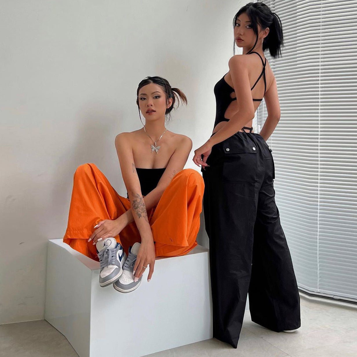 Women's high-waist lace-up straight-leg cargo pants in loose fit, casualwear by Plush Fashion Hub, shown in a relaxed fit style.