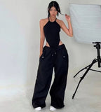 Women’s high-waist lace-up straight-leg cargo pants in loose fit, casualwear by Plush Fashion Hub, shown on a model.