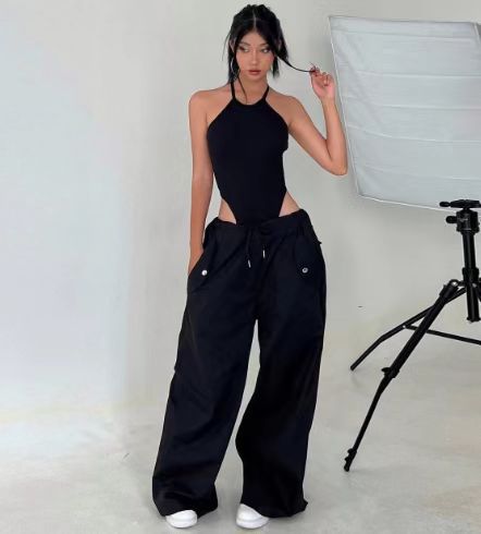 Women’s high-waist lace-up straight-leg cargo pants in loose fit, casualwear by Plush Fashion Hub, shown on a model.