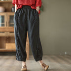Women’s high-waist solid-color Capri harem pants in casualwear style, featuring a relaxed fit and comfortable design.