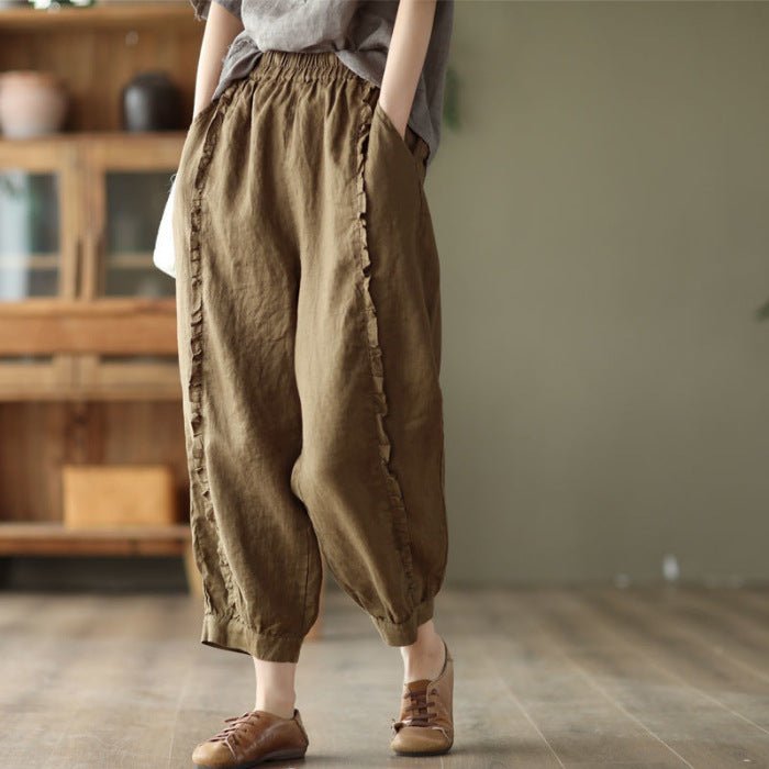 Women's high-waist solid-color harem capri pants in casualwear style, featuring a relaxed fit and comfortable design.