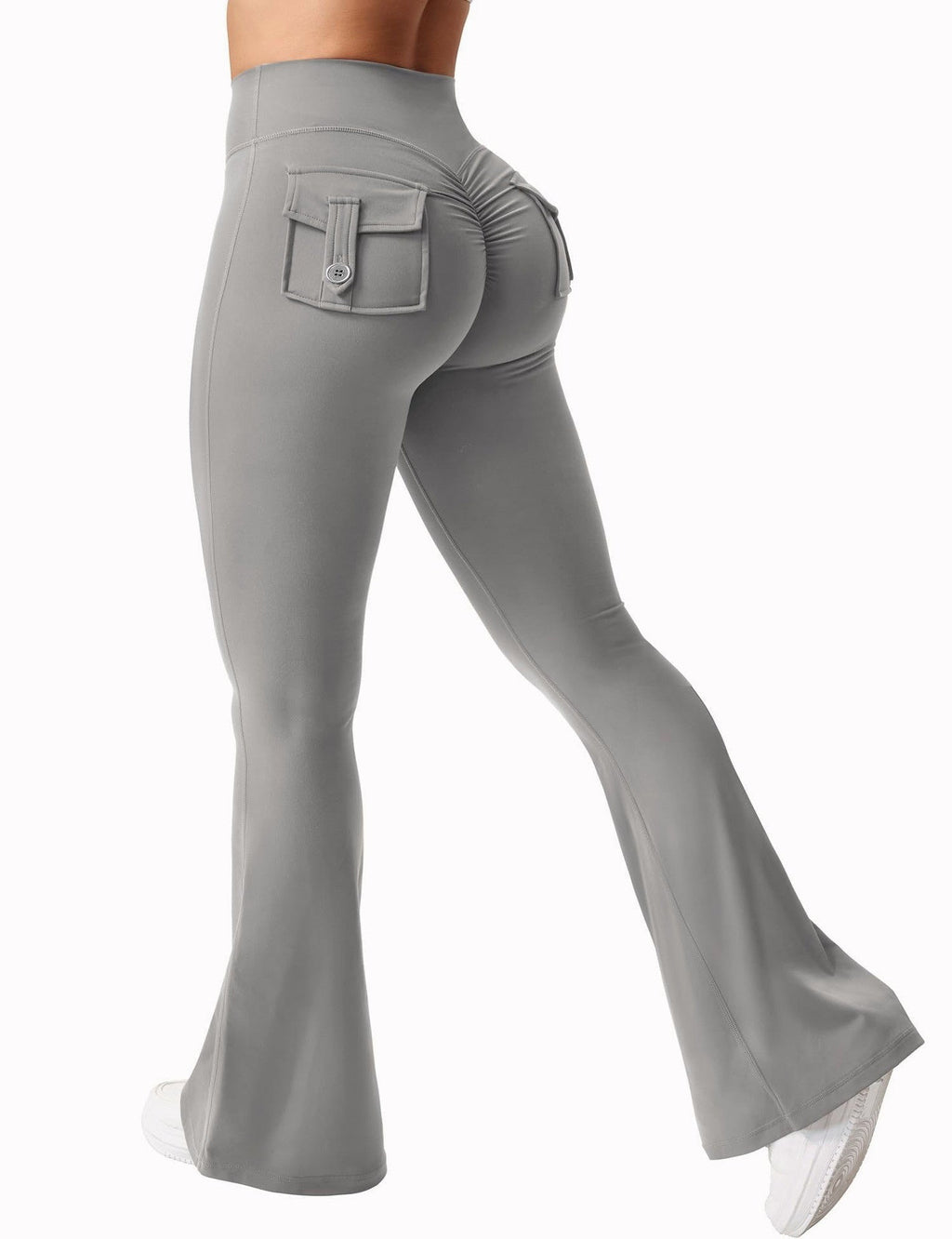 Black women's high-waisted cargo pocket workout leggings from Plush Fashion Hub, featuring a snug fit and functional pockets.