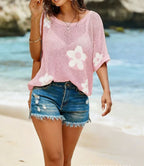 Women’s hollow-out drop-shoulder loose knit top from Plush Fashion Hub, casualwear with stylish open shoulder design.