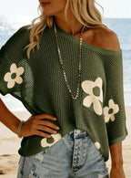 Women's loose knit top with hollow-out design and drop-shoulder style, casualwear by Plush Fashion Hub.