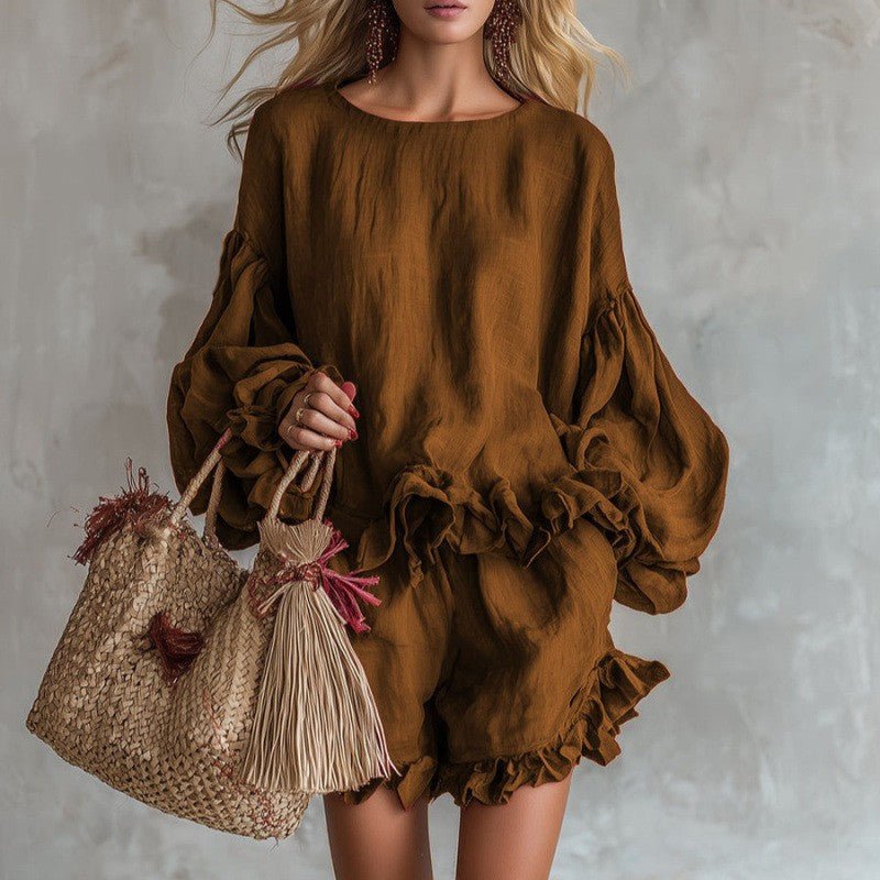 Casual women's lantern sleeve top and shorts two-piece set by Plush Fashion Hub, loose fit with relaxed style for comfortable wear.