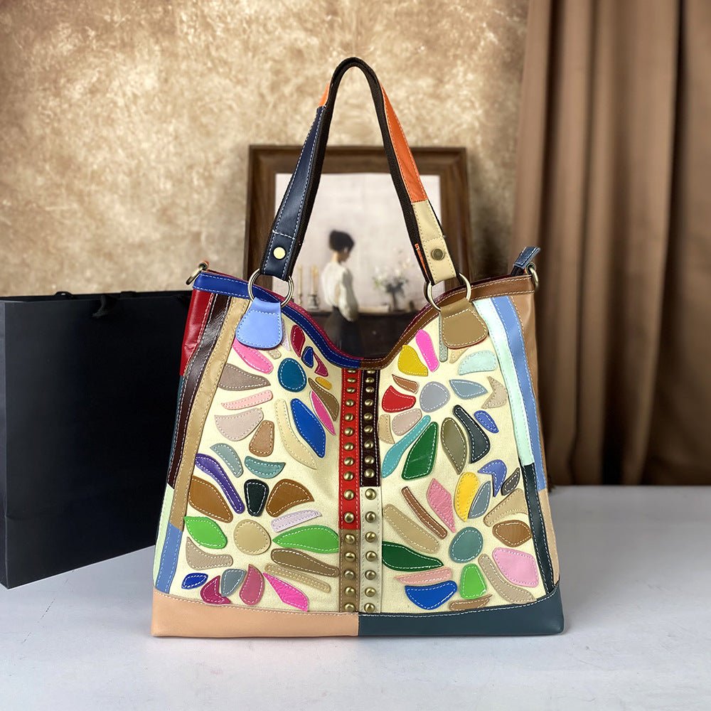 Large genuine leather women's crossbody bag with nautical-style design, featuring spacious compartments and a stylish maritime look.