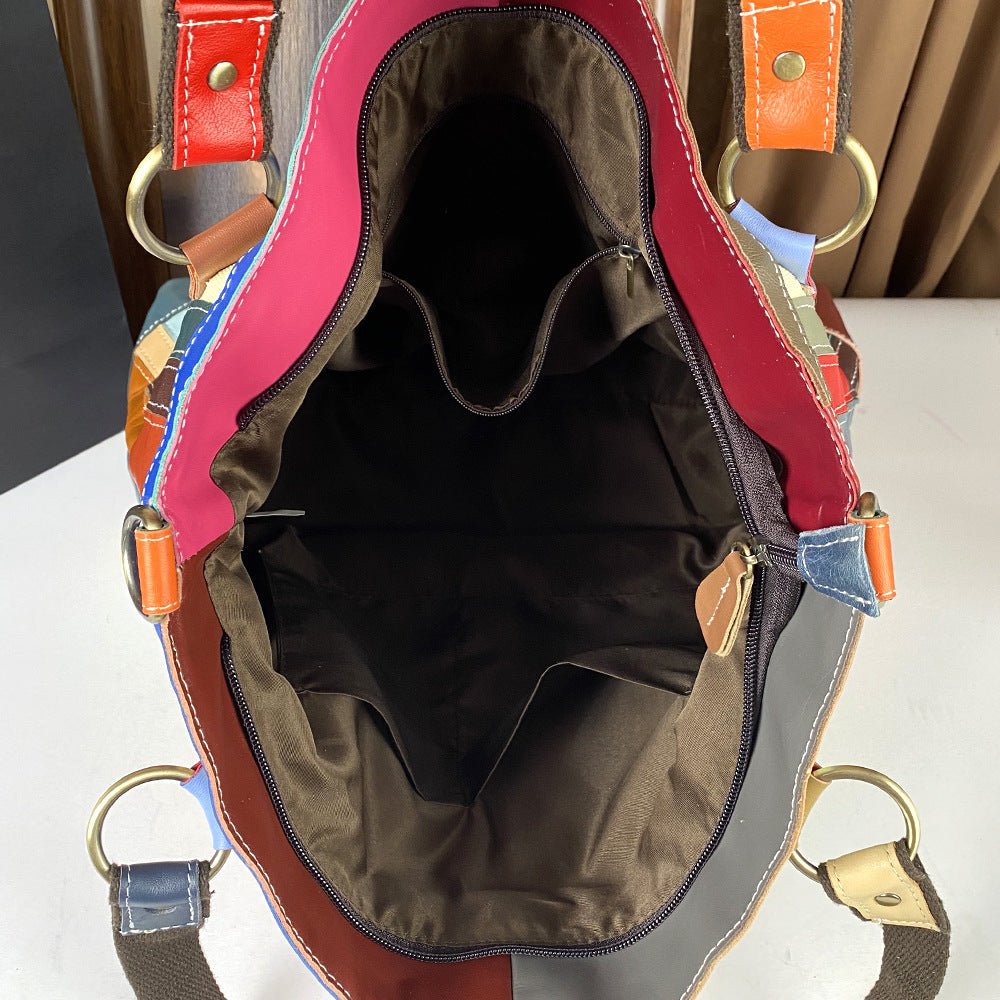 Genuine leather women's large-capacity crossbody bag with nautical-style design, featuring adjustable strap and maritime-inspired details.