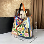 Genuine leather women's large-capacity crossbody bag with nautical-style design, featuring adjustable strap and gold hardware.