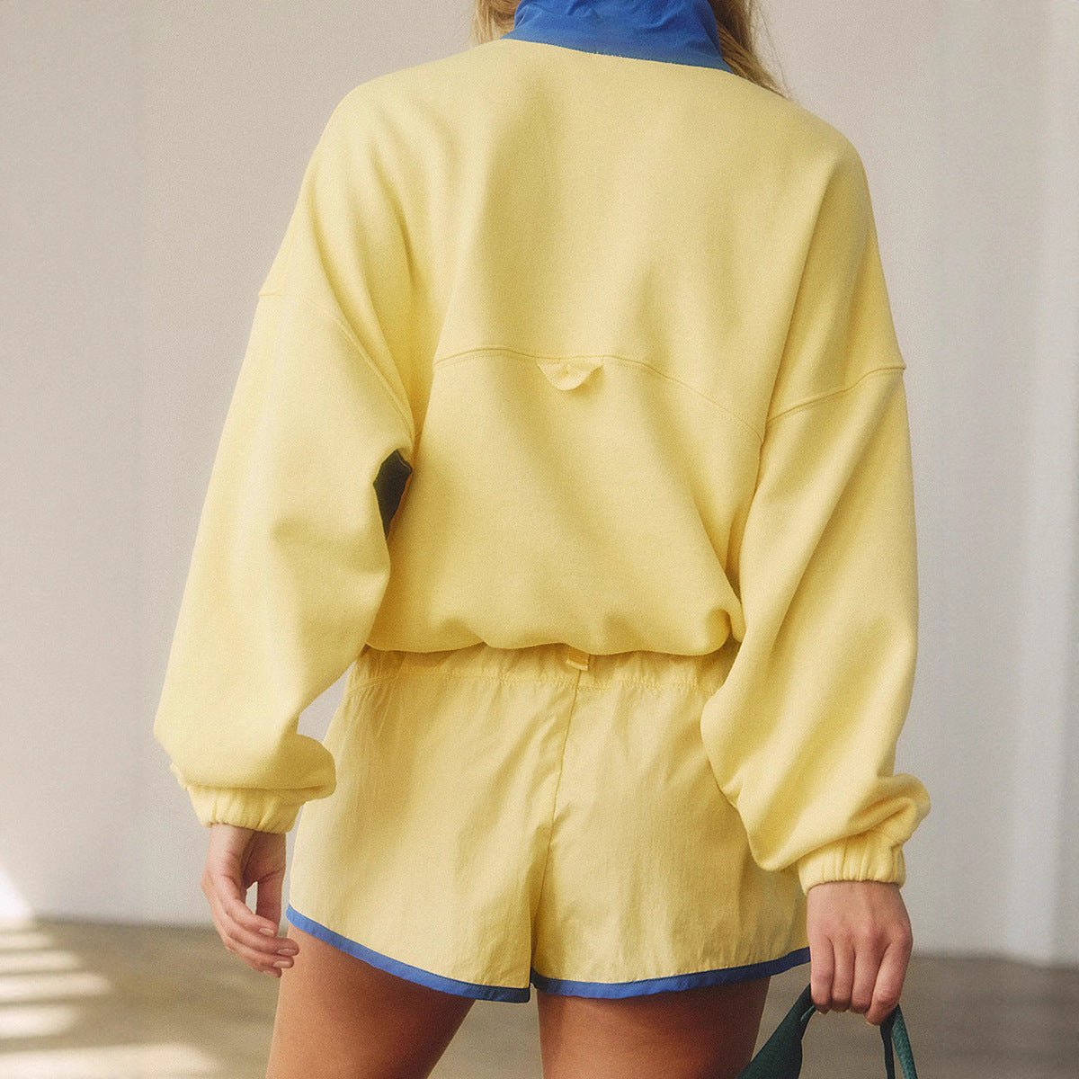 Women's long-sleeve contrast color 2-piece casualwear set with top and cropped pants by Plush Fashion Hub.