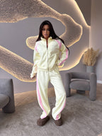 Women's long-sleeve zip-up jacket and sweatpants two-piece set by Plush Fashion Hub, casual loungewear with a comfortable fit.