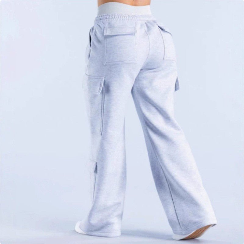 Women's loose-fit casual pants with pockets in solid two-tone color, by Plush Fashion Hub, displayed in a relaxed fit.