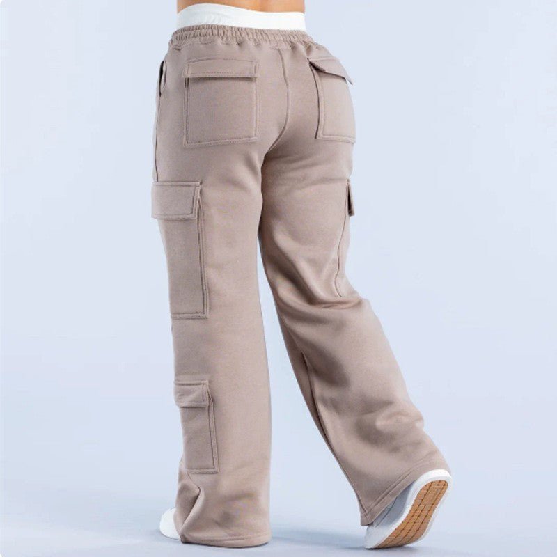 Women's loose-fit casual pants from Plush Fashion Hub with pockets, featuring a stylish solid color two-tone design.
