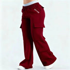 Women's loose-fit casual pants with pockets in solid two-tone color by Plush Fashion Hub, shown in a relaxed fit style.