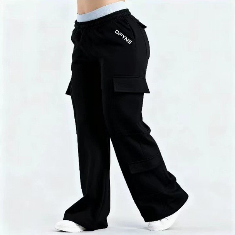 Women's loose-fit casual pants with pockets in a solid two-tone color, featuring a Plush Fashion Hub label.