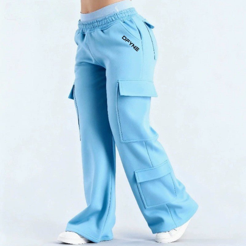 Women's loose-fit casual pants with pockets in solid two-tone color, featuring a Plush Fashion Hub label, perfect for everyday wear.