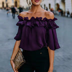 Women’s loose-fit short-sleeve minimalist casual shirt from Plush Fashion Hub, shown in a relaxed fit and simple design.