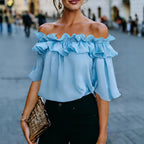 Women’s loose-fit minimalist short-sleeve casual shirt by Plush Fashion Hub, shown in a relaxed fit style on a neutral background.
