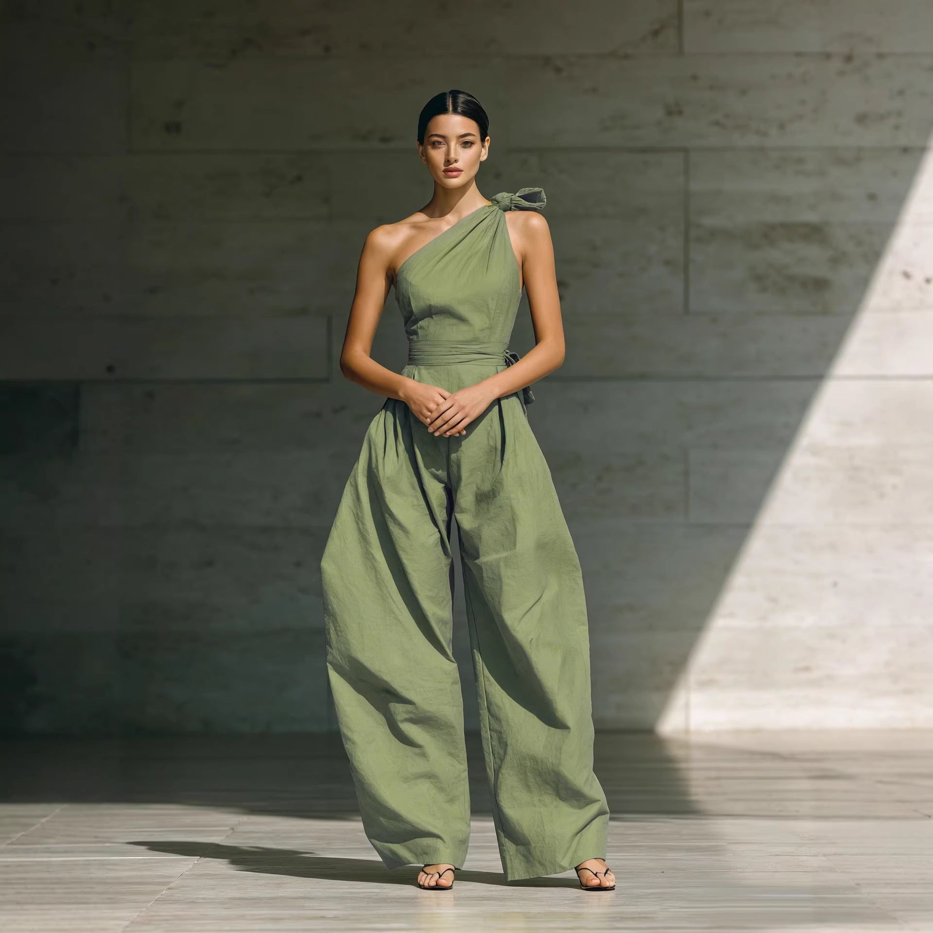 Women’s loose sleeveless off-shoulder belt jumpsuit with wide-leg design, casualwear from Plush Fashion Hub.