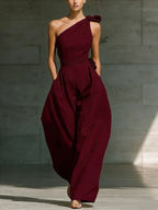 Women's loose sleeveless off-shoulder jumpsuit with belt and wide-leg design, casualwear from Plush Fashion Hub.