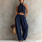 Women's loose sleeveless linen blend top and wide-leg pants set, casualwear by Plush Fashion Hub, shown on a model.
