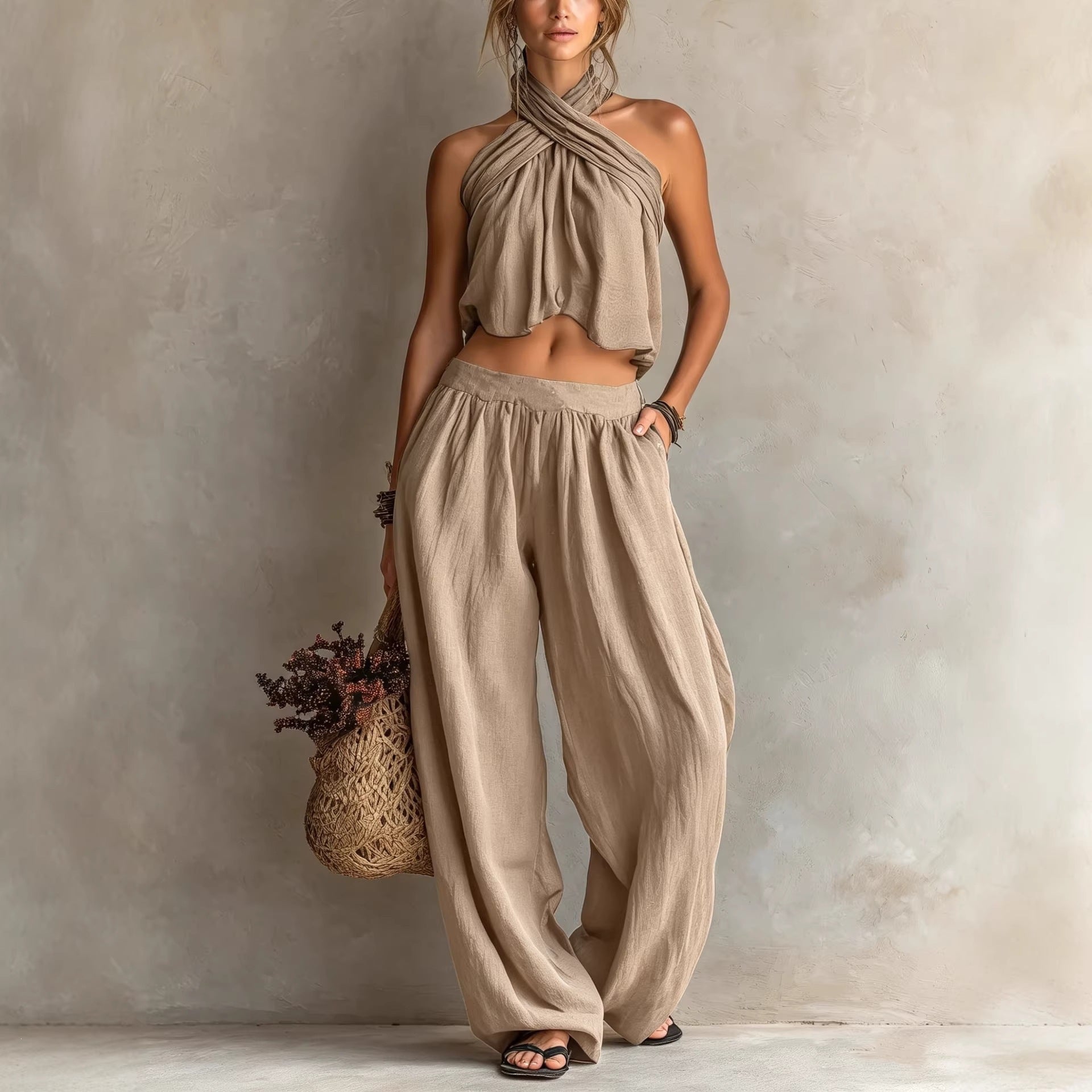 Women's loose sleeveless linen blend top and wide-leg pants set, casualwear, comfortable and stylish for warm weather.