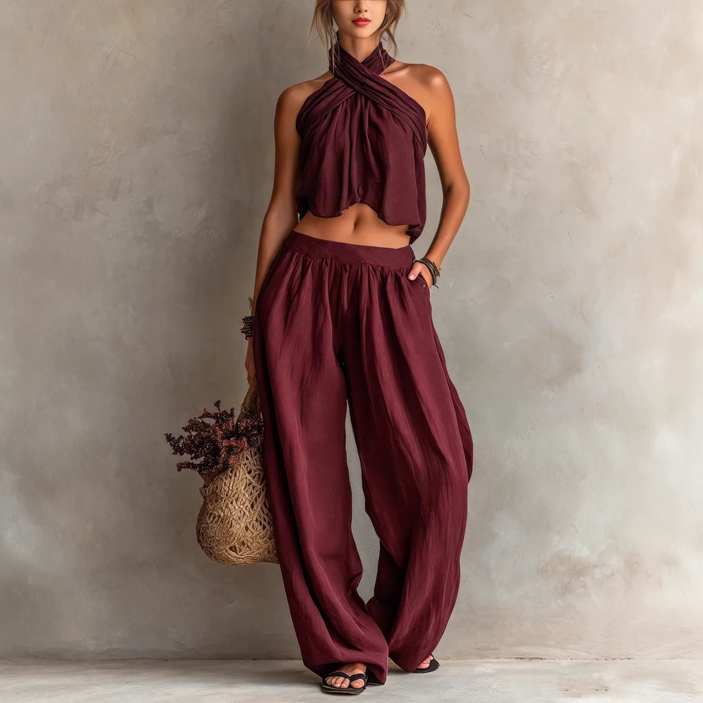Women's loose sleeveless linen blend top and wide-leg pants set, casualwear by Plush Fashion Hub, shown on a model.
