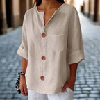 Women's loose V-neck T-shirt from Plush Fashion Hub, made of cotton linen with button detail, casualwear top.