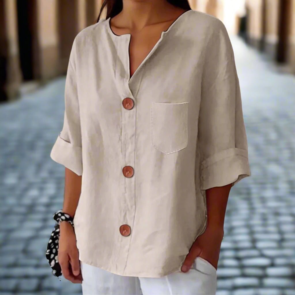 Women's loose V-neck T-shirt from Plush Fashion Hub, made of cotton linen with button detail, casualwear top.