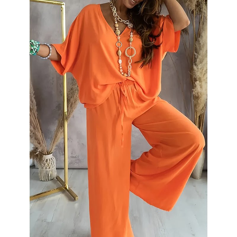 Women’s lounge set with wide-leg pants by Plush Fashion Hub, casualwear ensemble featuring comfortable, relaxed-fit pants and matching top.