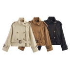 Women's short trench coat with notch collar and belt buckle detail, stylish jacket by Plush Fashion Hub.