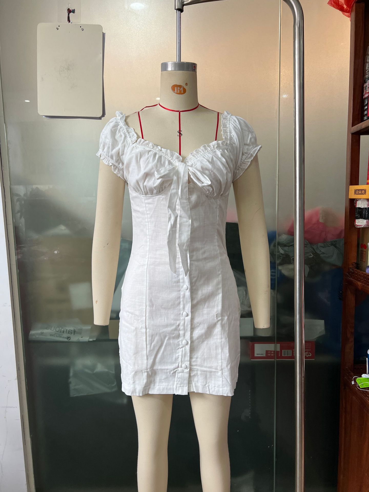 Women's off-shoulder lace-up puff-sleeve sheath dress from Plush Fashion Hub, featuring a single-breasted casualwear design.