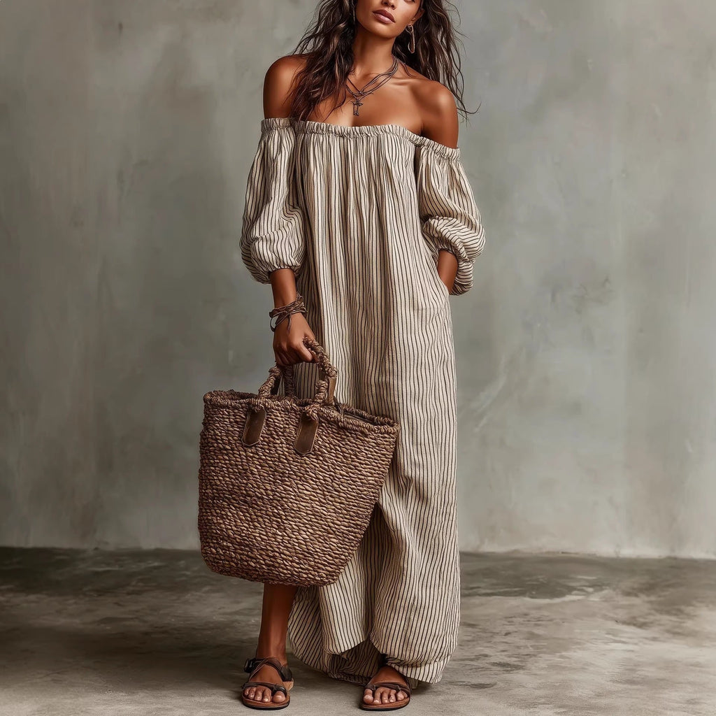 Women's off-shoulder long-sleeve maxi dress in casualwear style, featuring flowing fabric and a relaxed fit by Plush Fashion Hub.