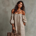 Women's off-shoulder long-sleeve maxi dress by Plush Fashion Hub, casualwear style with flowing fabric and elegant neckline.