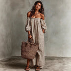 Women's off-shoulder long-sleeve maxi dress by Plush Fashion Hub, flowing casualwear with a stylish neckline and full-length design.