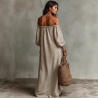 Women's off-shoulder long-sleeve maxi dress by Plush Fashion Hub, casualwear with flowing fabric and elegant neckline.