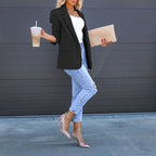 Women’s open-front casual blazer by Plush Fashion Hub, shown in a relaxed fit with lapel collar and long sleeves.