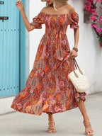 Women’s paisley one-shoulder maxi dress by Plush Fashion Hub, featuring flowing casualwear with a stylish paisley pattern.