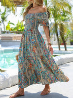 Women’s paisley one-shoulder maxi dress by Plush Fashion Hub, casualwear, flowing fabric with a stylish one-shoulder design.