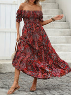 Women’s paisley one-shoulder maxi dress by Plush Fashion Hub, casualwear style with flowing fabric and stylish design.