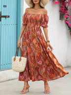 Women’s paisley one-shoulder maxi dress by Plush Fashion Hub, casualwear style with flowing fabric and elegant design.
