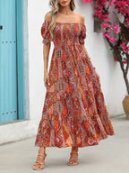 Women’s paisley one-shoulder maxi dress by Plush Fashion Hub, casualwear style with flowing fabric and elegant design.