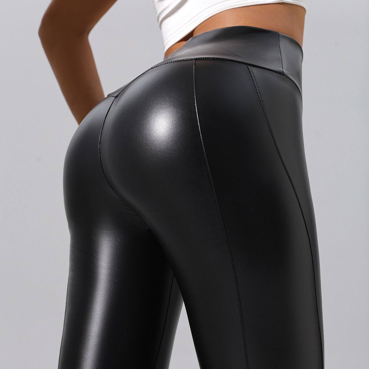 Women’s patchwork leather pants by Plush Fashion Hub, ideal for running, fitness, and yoga casualwear, shown in a stylish pose.