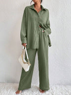 Women's pleated long sleeve lapel two-piece casual set with loose top and matching pants by Plush Fashion Hub.