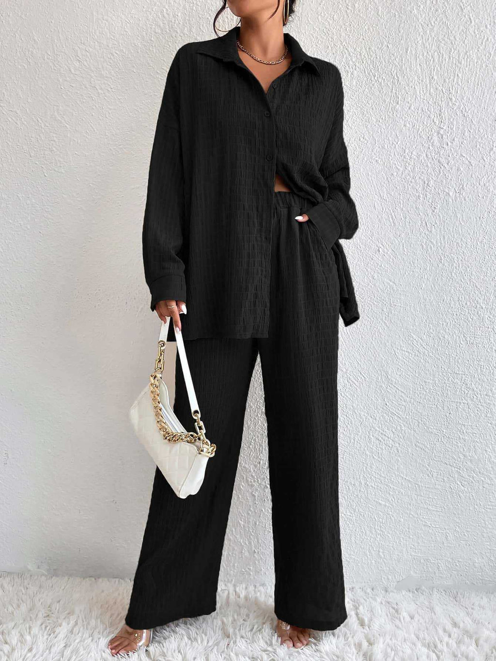 Women's pleated long sleeve lapel two-piece set by Plush Fashion Hub featuring a loose top and matching pants.