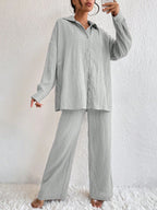 Women's pleated long sleeve lapel two-piece casualwear set with loose top and pants from Plush Fashion Hub.