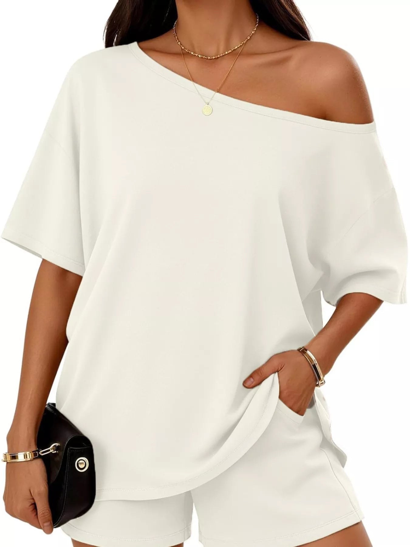 Plus size women's boat neck T-shirt and shorts lounge set by Trendsi, comfortable casual clothing for relaxed wear.