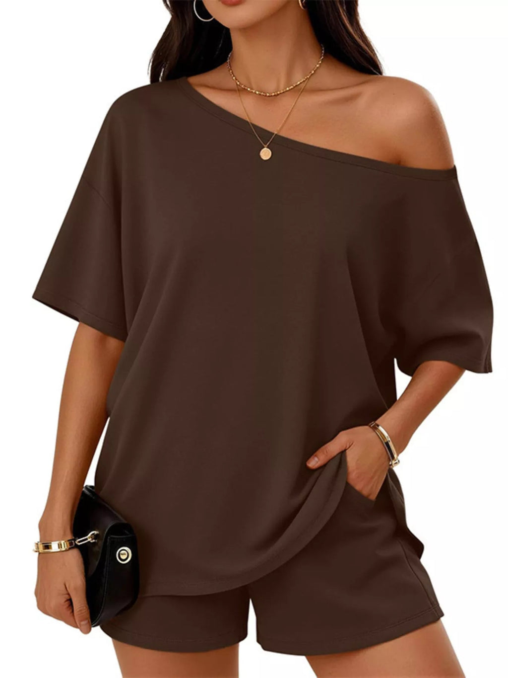 Plus size women's boat neck T-shirt and shorts lounge set by Trendsi, casual and comfortable clothing set for relaxed wear.